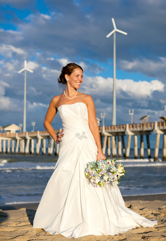 webbride Megan Weber Duke strikes a pose after her beach wedding and reception in Oceanview Hall at Jennette’s Pier recently.