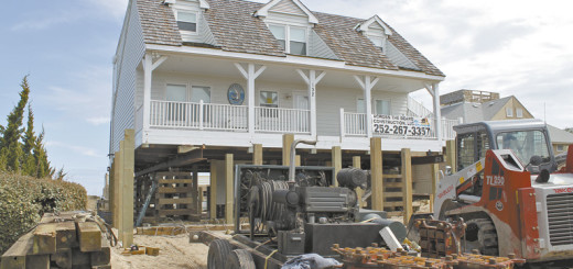 Hollerman house being moved back from the sea.