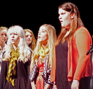 Michelle Hall, Torrie Dalgo and Rachel Zuhars of the FFHS Advanced Choir.