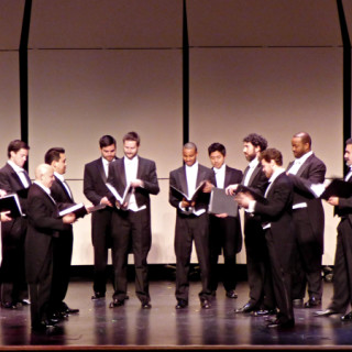 Chanticleer on stage at the First Flight High School auditorium.