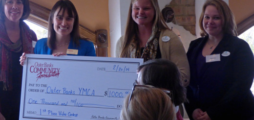Outer Banks Y receiving award for best video on the use of OBCF funds. (LtoR) Dorothy Killinsworth, board member; Lorelei Costa, OBCF Executive Director; Laura Kirby, Outer Banks Y; Katie Burgus, Executive Director Outer Banks Y.