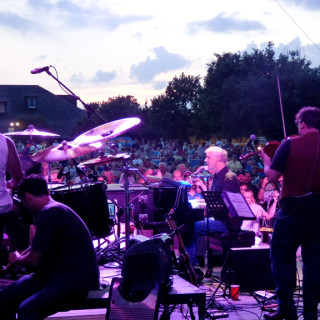 Bruce Hornsby and the Noisemakers taking the stage at sunset. Photo, Kip Tabb