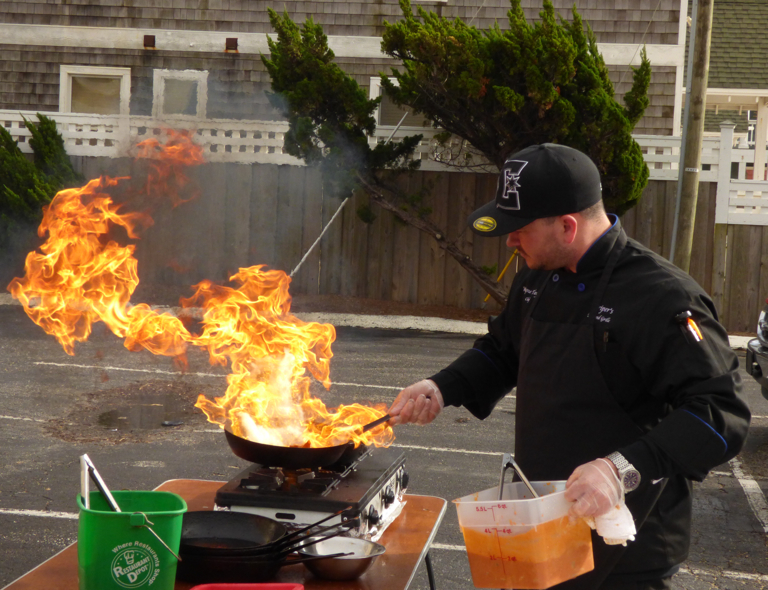 At Stripers table. Preparing the chilpote honey mahi. Served on a crisp warm taco.