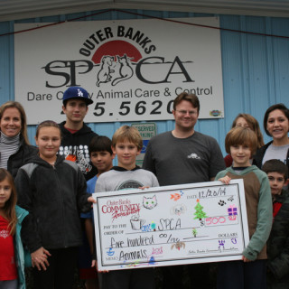 Community Foundation Giving Circle presenting check to the Outer Banks SPCA.