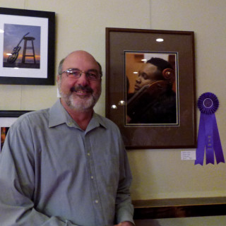 Judge's Award winner, George Wood with his photograph Mellow Cello.