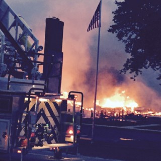 Brindley Beach Corolla office in flames, Friday, June 12, 2015.
