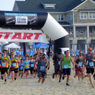 And they're off! Competitors begin running the 2015 Storm the Beach. Photo, Kip Tabb