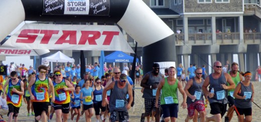 And they're off! Competitors begin running the 2015 Storm the Beach. Photo, Kip Tabb