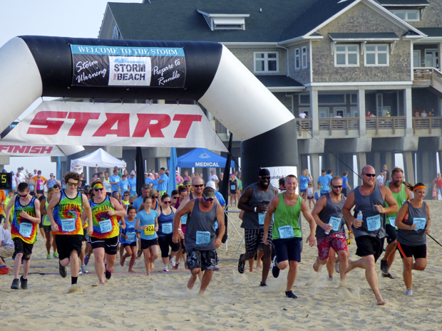 And they're off! Competitors begin running the 2015 Storm the Beach. Photo, Kip Tabb