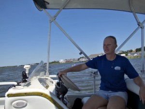 Captain Christine Lester at the helm, leaving Duck.