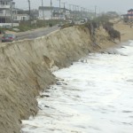 At the recently repaired stretch of the Beach Road north of the Black Pelican, high tide Thursday afternoon.
