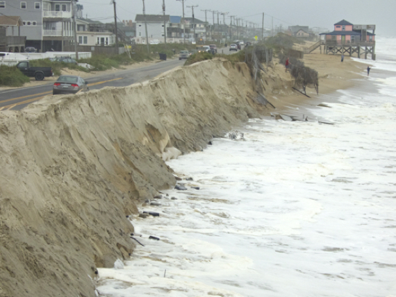 At the recently repaired stretch of the Beach Road north of the Black Pelican, high tide Thursday afternoon.