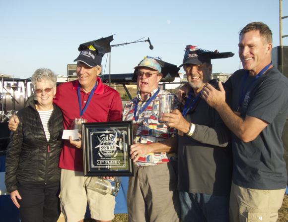 Winning team Loonies on Tap receives their plaque. Pictured: (LtoR) Carol Sparks, daughter of Francis and Gertrude Rogallo, Tom Haddon, Jeff Fischer, Ralph Buxton and Bruce Weaver.