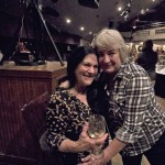Maxine Rossman and Julie Short of Carolina Designs at the fundraiser at Kelly's Tavern Wednesday night.