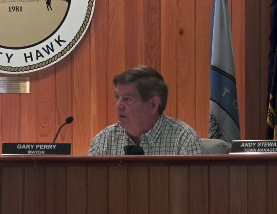 Kitty Hawk Mayor Gary Perry discussing his concerns about the intralocal beach nourishment project