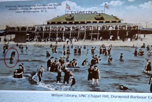 1917 postcard showing early evidence of surfing. Red circle is a board with a rider on it. Image from NC Maritime History presentation.