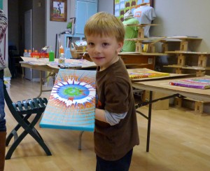 Four-year-old Keegan with his creation. Keegan had to leave before the final picture was taken.