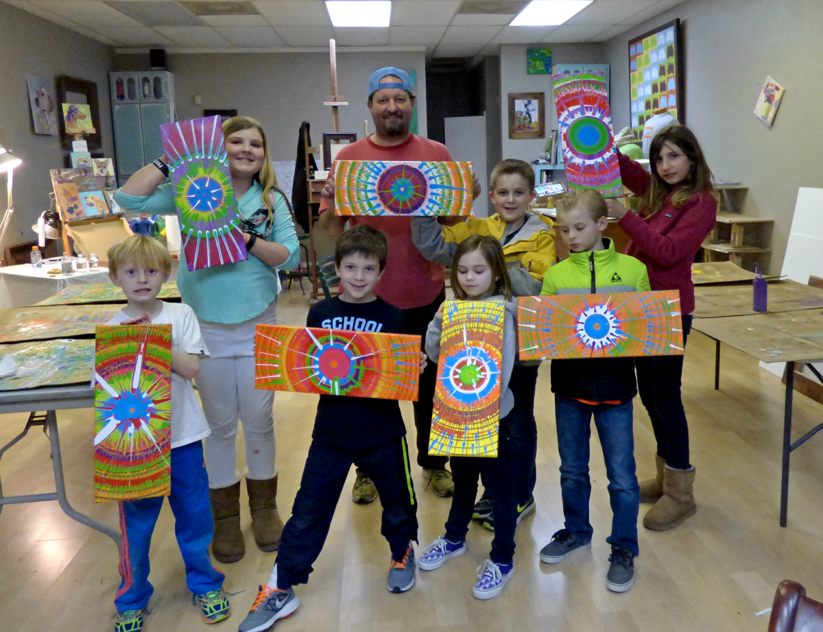 Artists with their completed masterpieces. Front Row (LtoR): Jake, Caden, Abby, Seth; Back Row: Bella, Brad Price, Hunter, Reagan. (I hope I have the names in the right order.)
