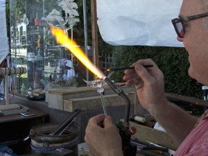 Curtis Cecil creating a glass bird.