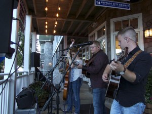 Nu-Blu performing on the porch in front of Bluegrass Island.
