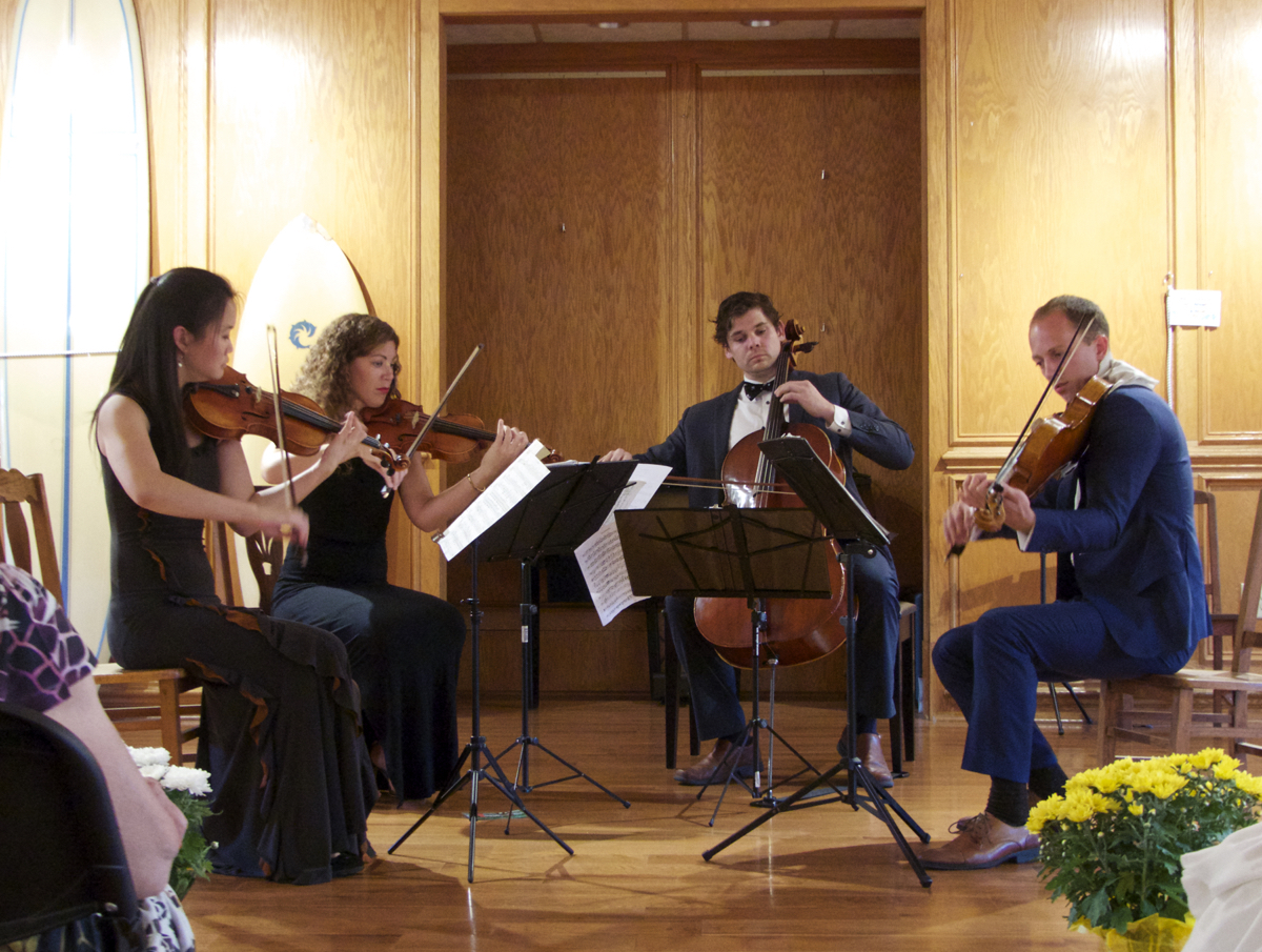 Performing Debussy's String Quartet in G Mino at the DCAC Gallery. (LtoR) Katie Hyun, Elizabeth Vonderheide, Jacob Fowler, Luke Fleming.