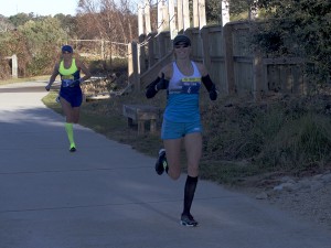 Joyce Miller waving with eventual winner Svetlana Pretot close on her heels.
