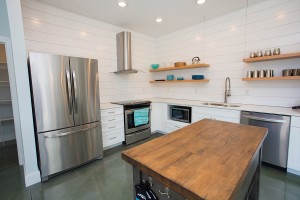 Sleek designs complete the kitchen area. 