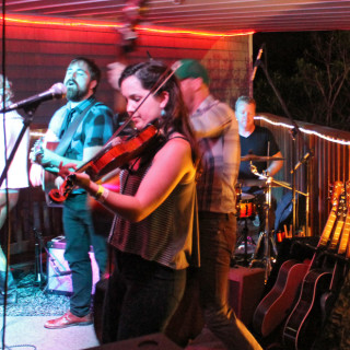 Dave Mayfield Parade performing at the Mustang Music Festival