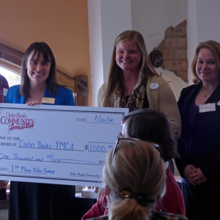 Outer Banks Y receiving award for best video on the use of OBCF funds. (LtoR) Dorothy Killinsworth, board member; Lorelei Costa, OBCF Executive Director; Laura Kirby, Outer Banks Y; Katie Burgus, Executive Director Outer Banks Y.