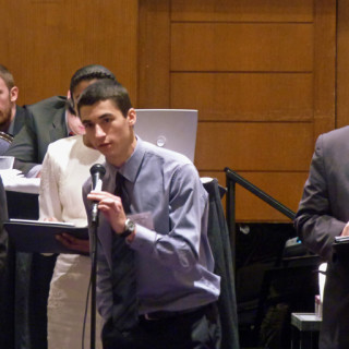 Joseph Lupetin responding to a question about a resolution Togo was co-sponsoring. Trevor Bruce is to the right of him.