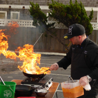At Stripers table. Preparing the chilpote honey mahi. Served on a crisp warm taco.