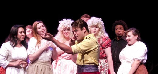 Zachary Pfrimmer as Gaston explaining to his adoring fans the nuances of hunting.