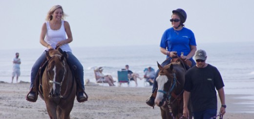 Riding on the beach in Corolla. (Lto R)LeeAnn McGraw, Maggie, Cody Edwards leading the horse. Cody walked the length of the ride.