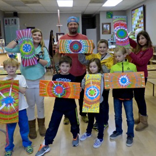 Artists with their completed masterpieces. Front Row (LtoR): Jake, Caden, Abby, Seth; Back Row: Bella, Brad Price, Hunter, Reagan. (I hope I have the names in the right order.)